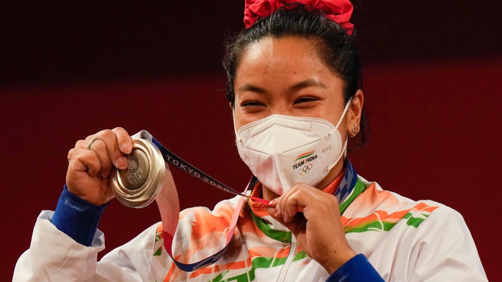 Mira Bai Chanu Brings home Silver Medal : Despite having wrist issue.